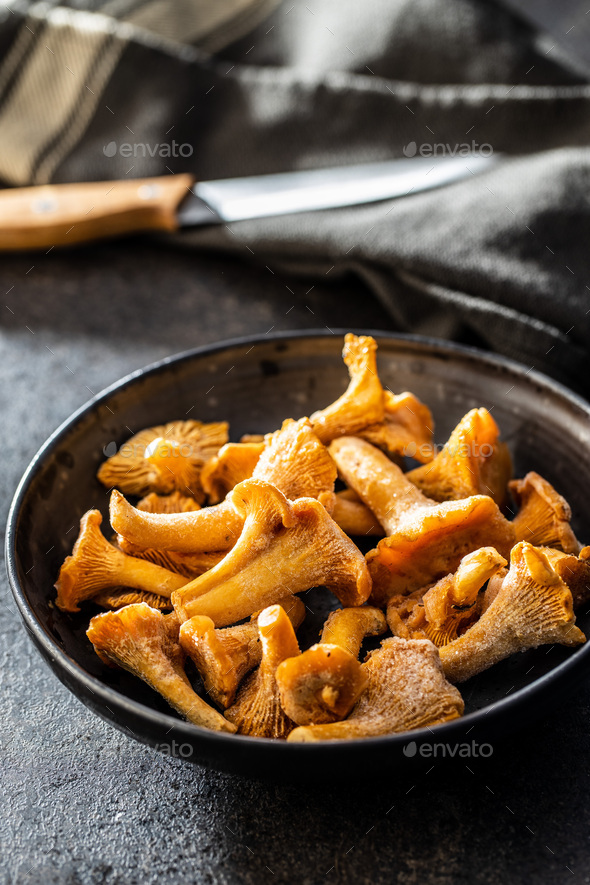 Frozen chanterelle mushrooms Stock Photo by jirkaejc PhotoDune